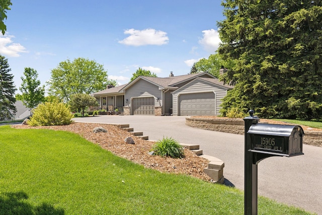 15905 43rd Ave N, Plymouth, MN 55446 - ranch-style home featuring an attached garage, a front lawn, and driveway
