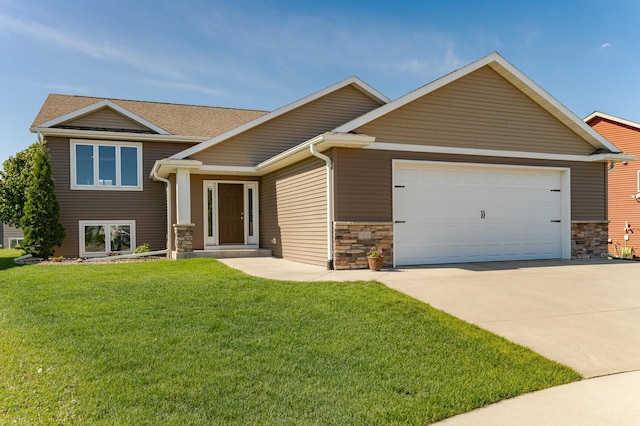 1436 Tunbridge Pl NE, Byron, MN 55920 - view of front of home with driveway, a garage, stone siding, a front yard, and a shingled roof