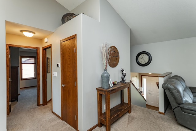 1436 Tunbridge Pl NE, Byron, MN 55920 - corridor featuring carpet, an upstairs landing, vaulted ceiling, and baseboards