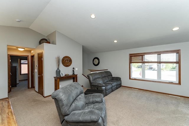 1436 Tunbridge Pl NE, Byron, MN 55920 - living room featuring vaulted ceiling, light colored carpet, baseboards, and recessed lighting