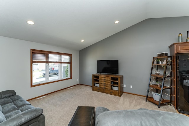 1436 Tunbridge Pl NE, Byron, MN 55920 - living area featuring vaulted ceiling, recessed lighting, light colored carpet, and baseboards