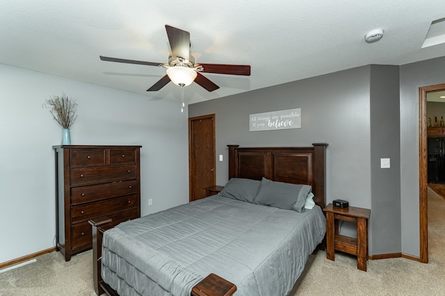 1436 Tunbridge Pl NE, Byron, MN 55920 - bedroom with light colored carpet, baseboards, black fridge, and ceiling fan