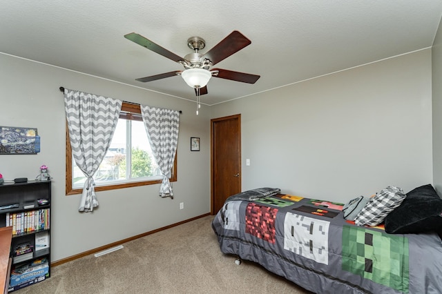 1436 Tunbridge Pl NE, Byron, MN 55920 - carpeted bedroom featuring baseboards and a ceiling fan