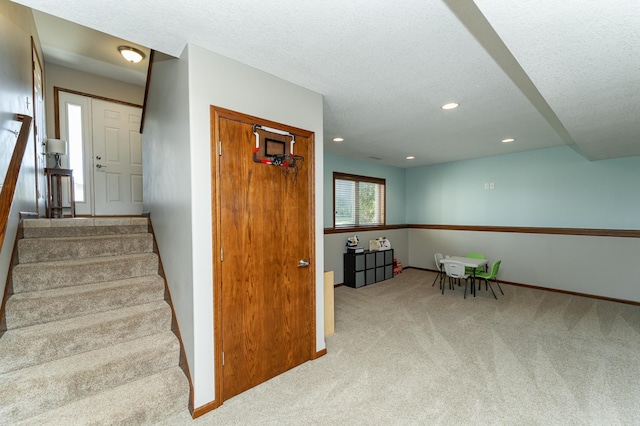 1436 Tunbridge Pl NE, Byron, MN 55920 - staircase with carpet, a textured ceiling, recessed lighting, and baseboards