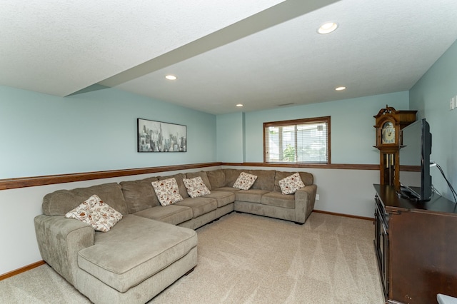 1436 Tunbridge Pl NE, Byron, MN 55920 - living room featuring light colored carpet, baseboards, and recessed lighting