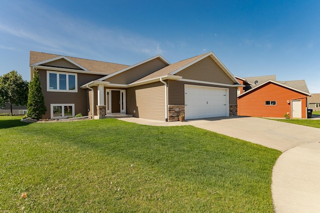 1436 Tunbridge Pl NE, Byron, MN 55920 - craftsman-style home featuring a garage, concrete driveway, a front lawn, and roof with shingles