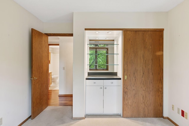 20 Windsor Ln Unit 213A, New Brighton, MN 55112 - unfurnished bedroom with light carpet and baseboards