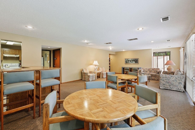20 Windsor Ln Unit 213A, New Brighton, MN 55112 - dining area with carpet, recessed lighting, and baseboards