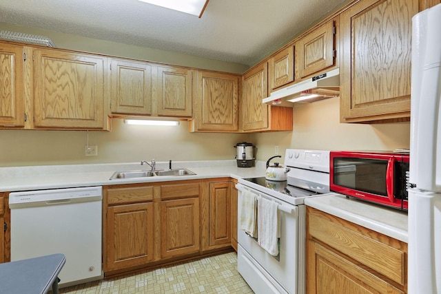 20 Windsor Ln Unit 213A, New Brighton, MN 55112 - kitchen featuring white appliances, under cabinet range hood, a sink, and light countertops