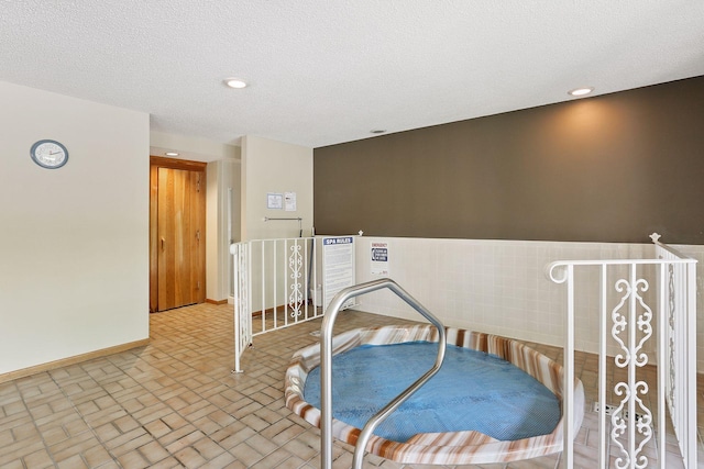 20 Windsor Ln Unit 213A, New Brighton, MN 55112 - bedroom with brick patterned flooring, baseboards, recessed lighting, and wainscoting