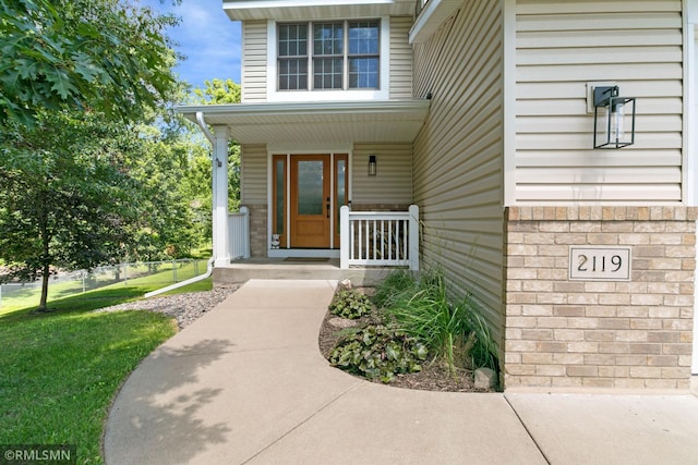 2119 13th Ave E, North Saint Paul, MN 55109 - property entrance featuring covered porch
