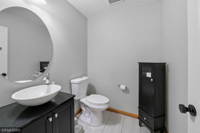 2119 13th Ave E, North Saint Paul, MN 55109 - half bath featuring vanity and tile patterned flooring