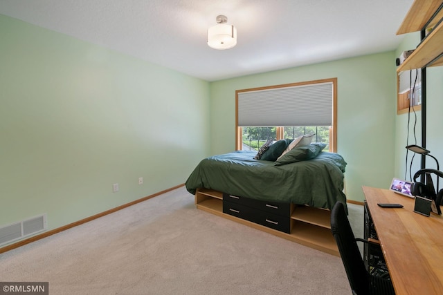 2119 13th Ave E, North Saint Paul, MN 55109 - carpeted bedroom featuring baseboards and a desk