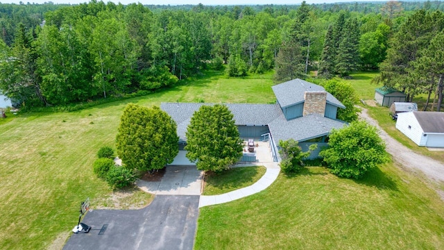 417 Main St S, Aurora, MN 55705 - view of subject property with a heavily wooded area