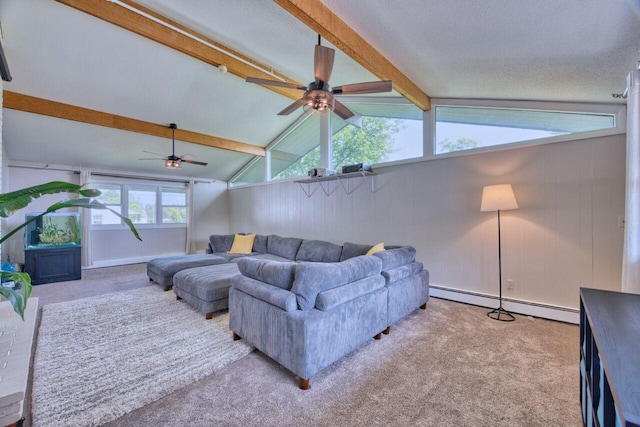 417 Main St S, Aurora, MN 55705 - carpeted living area featuring baseboard heating, a ceiling fan, and wood walls
