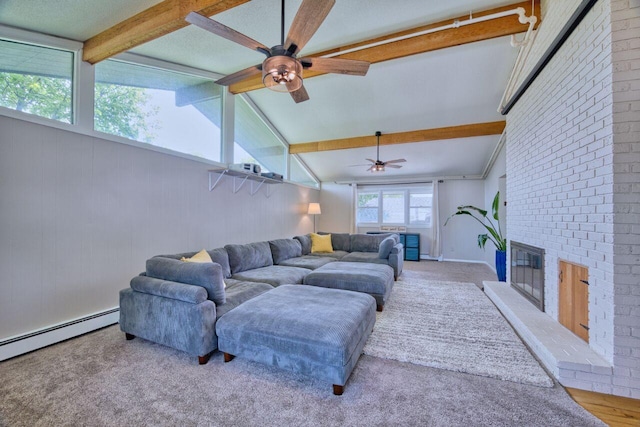 417 Main St S, Aurora, MN 55705 - living room with ceiling fan, a baseboard radiator, a fireplace, and carpet flooring
