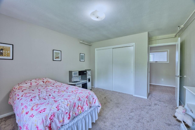 417 Main St S, Aurora, MN 55705 - carpeted bedroom featuring a closet and baseboards
