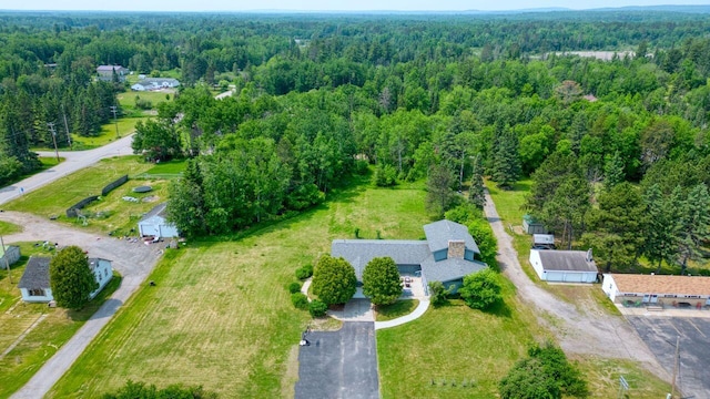 417 Main St S, Aurora, MN 55705 - aerial overview of property's location featuring a heavily wooded area