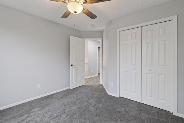 1418 Bluff St, Dundas, MN 55019 - unfurnished bedroom with carpet flooring, a textured ceiling, a closet, and ceiling fan