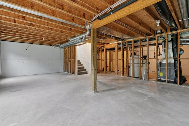 1418 Bluff St, Dundas, MN 55019 - unfinished below grade area featuring water heater and stairs