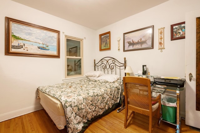 241 Queen Ave S, Minneapolis, MN 55405 - bedroom with wood finished floors and baseboards