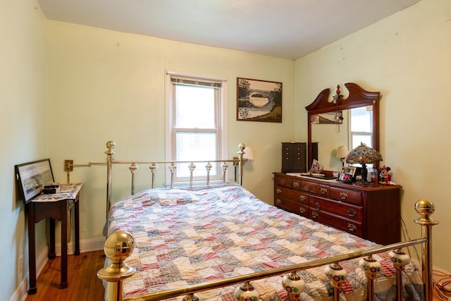 241 Queen Ave S, Minneapolis, MN 55405 - bedroom featuring wood finished floors and baseboards