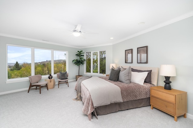 1101 Skyline Pkwy, Duluth, MN 55805 - bedroom with baseboards, crown molding, light carpet, and a ceiling fan