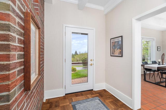 1101 Skyline Pkwy, Duluth, MN 55805 - entryway featuring ornamental molding, baseboards, and brick wall