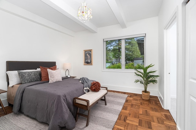 1101 Skyline Pkwy, Duluth, MN 55805 - bedroom featuring beamed ceiling, baseboards, and a chandelier