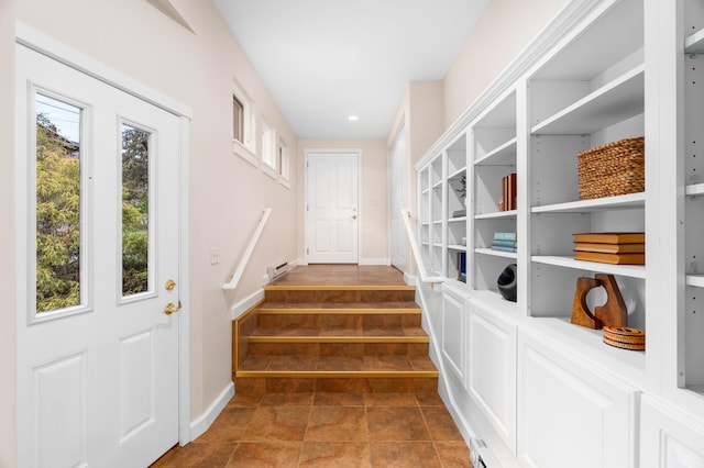 1101 Skyline Pkwy, Duluth, MN 55805 - doorway featuring baseboard heating, baseboards, stairs, and recessed lighting