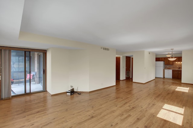 26 10th St W Unit 502, Saint Paul, MN 55102 - unfurnished living room with light wood finished floors