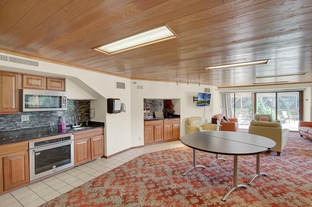 26 10th St W Unit 502, Saint Paul, MN 55102 - dining room with wood ceiling and light tile patterned floors