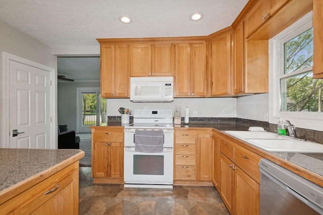 381 Ormsbee St, Big Lake, MN 55309 - kitchen with white appliances, a sink, recessed lighting, and dark stone finish floors