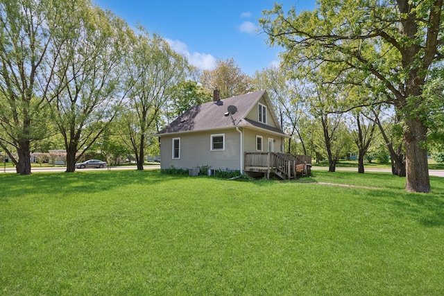 381 Ormsbee St, Big Lake, MN 55309 - view of side of home featuring a chimney, a lawn, and roof with shingles
