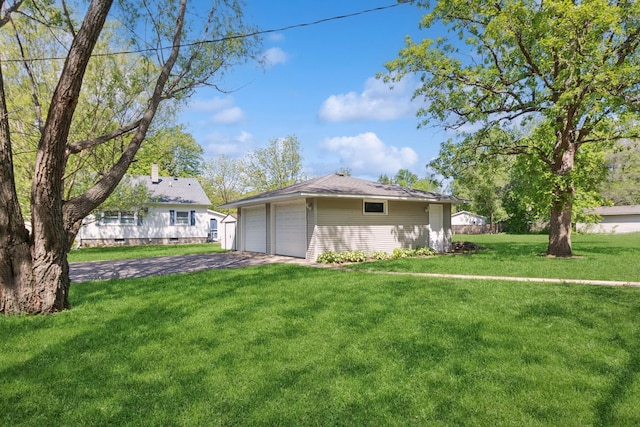 381 Ormsbee St, Big Lake, MN 55309 - view of home's exterior featuring an outbuilding, a yard, and a garage