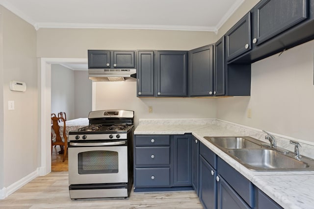 1418 Payne Ave, Saint Paul, MN 55130 - kitchen featuring stainless steel gas stove, under cabinet range hood, light wood-style flooring, crown molding, and light countertops