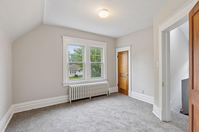 1418 Payne Ave, Saint Paul, MN 55130 - additional living space featuring radiator heating unit, carpet flooring, and lofted ceiling