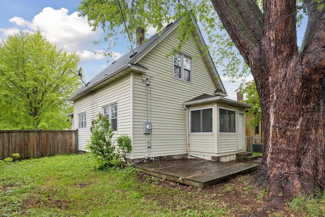 1418 Payne Ave, Saint Paul, MN 55130 - view of home's exterior with a deck and a central air condition unit