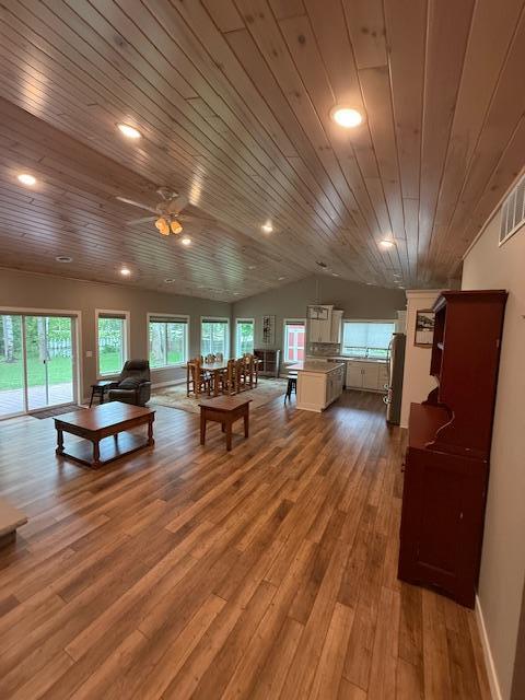 6207 Lagoon Dr NE, Bemidji, MN 56601 - living room with wooden ceiling, healthy amount of natural light, wood finished floors, ceiling fan, and vaulted ceiling
