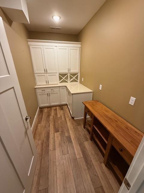 6207 Lagoon Dr NE, Bemidji, MN 56601 - laundry area featuring dark wood finished floors
