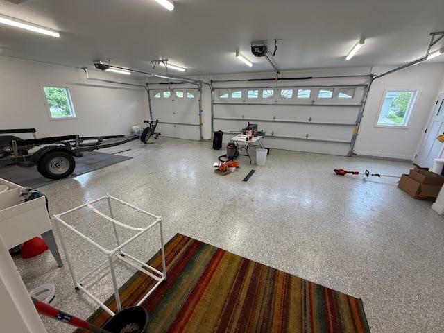 6207 Lagoon Dr NE, Bemidji, MN 56601 - garage with a garage door opener