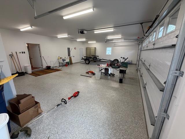 6207 Lagoon Dr NE, Bemidji, MN 56601 - garage with a garage door opener