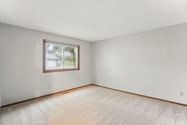 6251 Magda Dr Unit B, Maple Grove, MN 55369 - carpeted spare room featuring baseboards