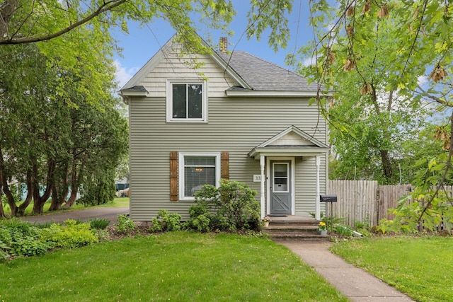 332 2nd St, New Richmond, WI 54017 - traditional-style home featuring roof with shingles
