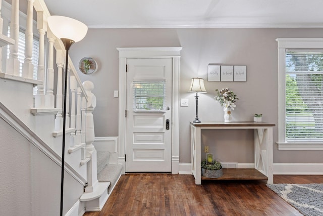 332 2nd St, New Richmond, WI 54017 - entryway featuring plenty of natural light, wood finished floors, stairway, and ornamental molding