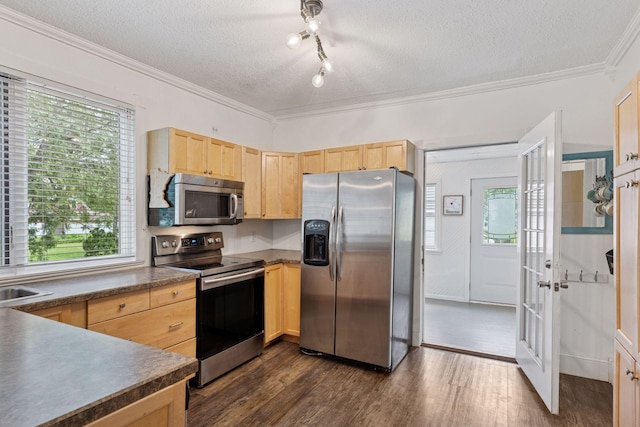 332 2nd St, New Richmond, WI 54017 - kitchen with appliances with stainless steel finishes, light brown cabinets, ornamental molding, dark countertops, and a textured ceiling