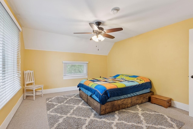 332 2nd St, New Richmond, WI 54017 - carpeted bedroom featuring baseboards, vaulted ceiling, and ceiling fan