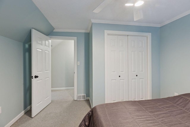 332 2nd St, New Richmond, WI 54017 - carpeted bedroom featuring a closet, ornamental molding, baseboards, and ceiling fan