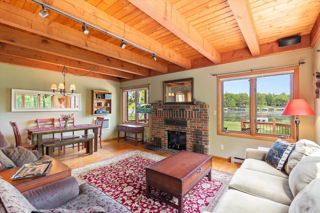 11690 Harbor Ln, Ideal Twp, MN 56442 - living area featuring track lighting, baseboard heating, a chandelier, wood finished floors, and wooden ceiling with exposed beams