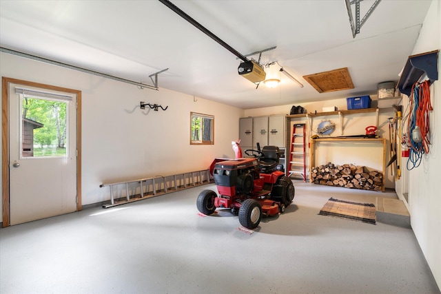 11690 Harbor Ln, Ideal Twp, MN 56442 - garage featuring a garage door opener